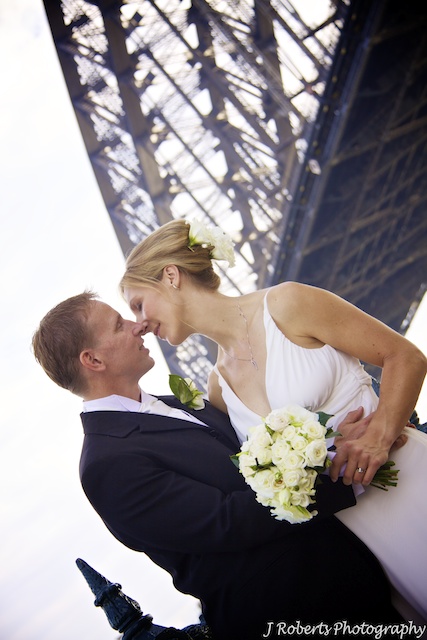 Bride and groom with Sydney Harbour Bridge - wedding photography